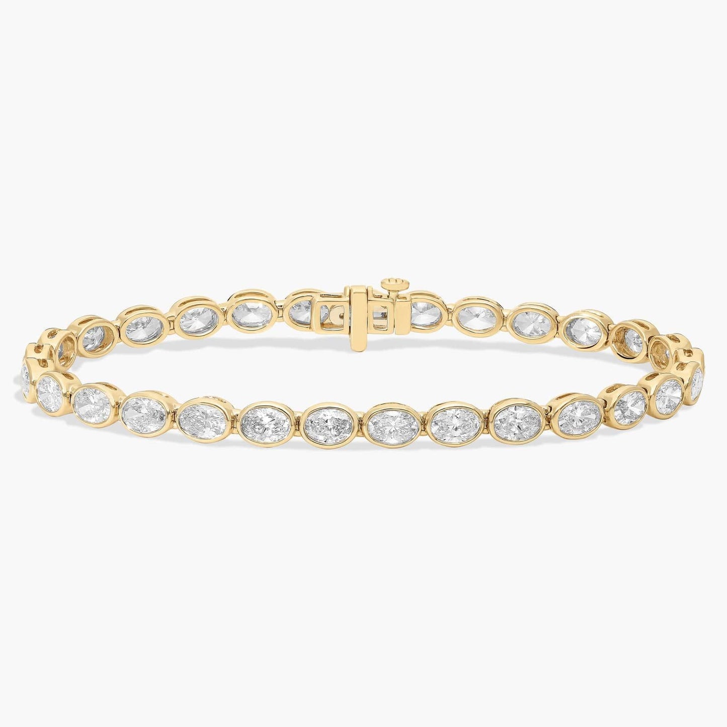 7 " Oval Cut Diamond E/W Bezel Set Tennis Bracelet In 14K Yellow Gold (8 Ct. tw. - H-I / SI1-SI2)